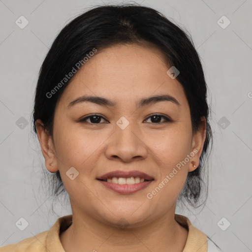 Joyful latino young-adult female with medium  brown hair and brown eyes