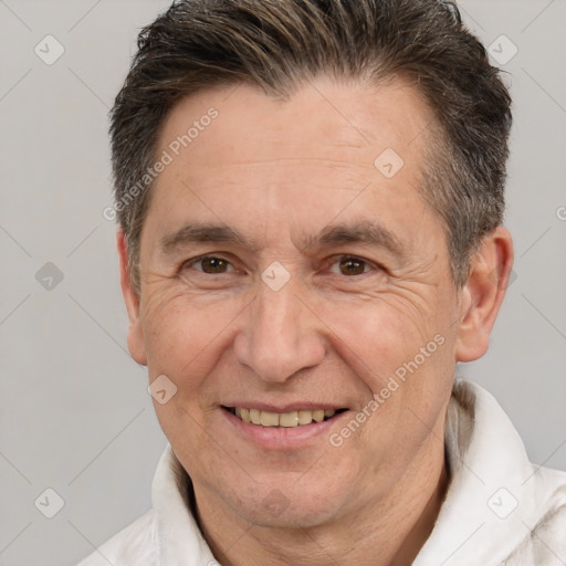 Joyful white middle-aged male with short  brown hair and brown eyes