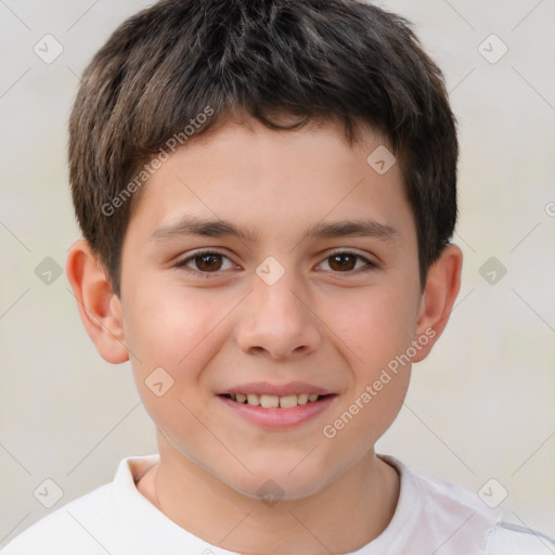 Joyful white child male with short  brown hair and brown eyes