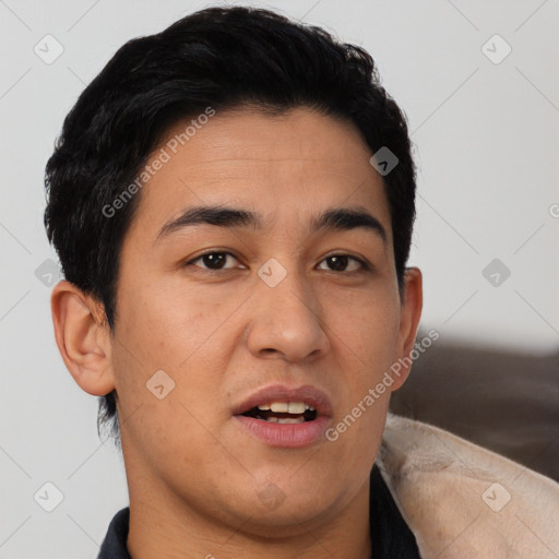 Joyful latino young-adult male with short  brown hair and brown eyes