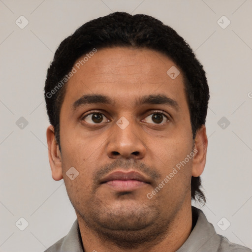 Neutral latino young-adult male with short  black hair and brown eyes