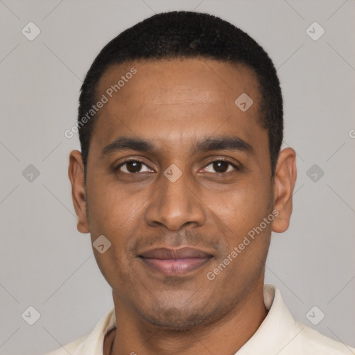Joyful black young-adult male with short  black hair and brown eyes