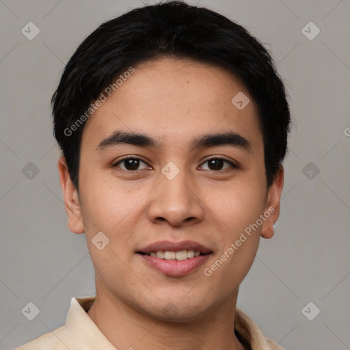 Joyful white young-adult male with short  black hair and brown eyes