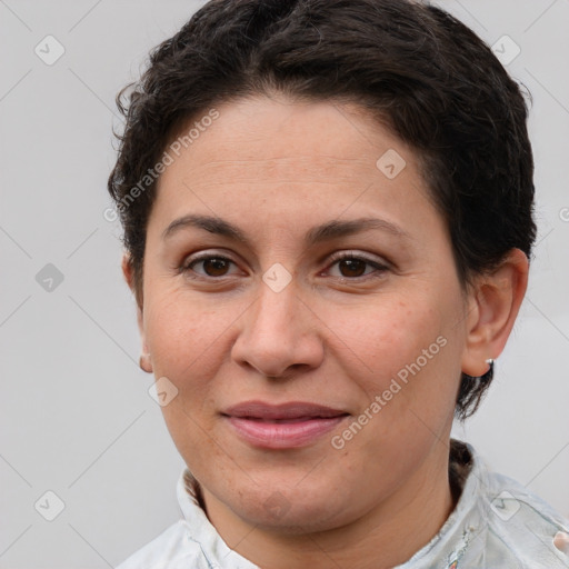 Joyful white adult female with short  brown hair and brown eyes