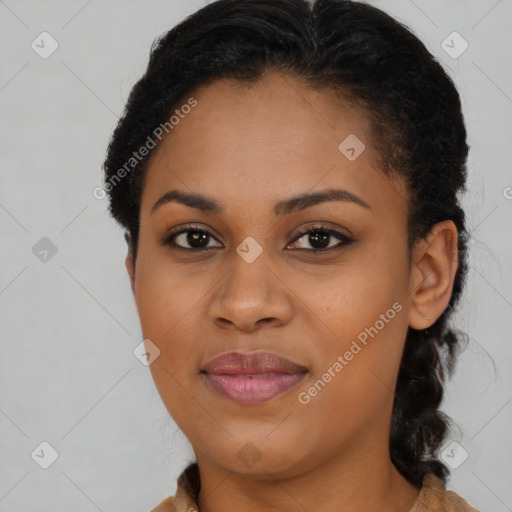 Joyful black young-adult female with long  brown hair and brown eyes