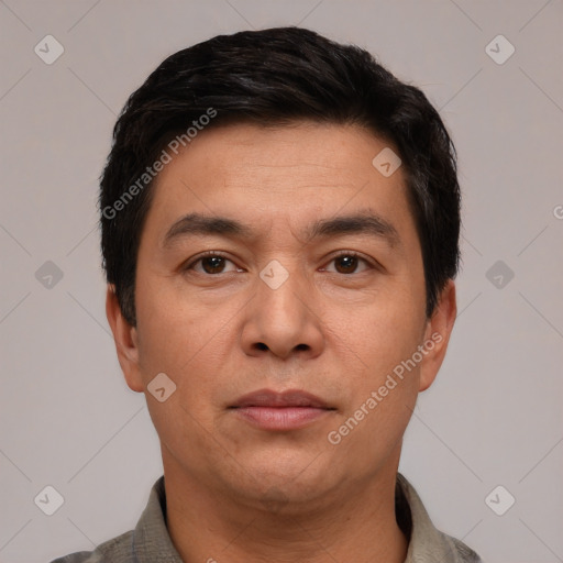 Neutral white young-adult male with short  black hair and brown eyes