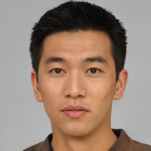 Neutral asian young-adult male with short  black hair and brown eyes