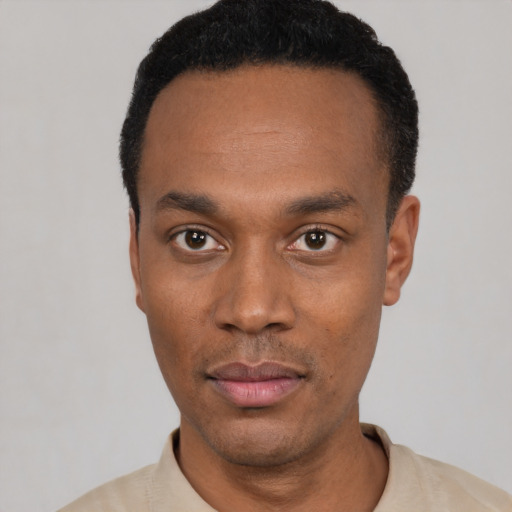 Neutral black young-adult male with short  black hair and brown eyes