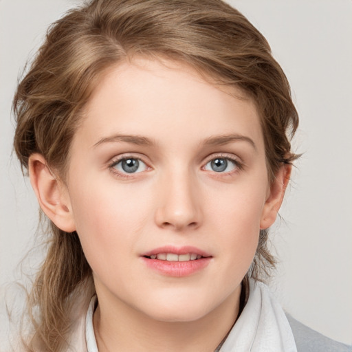 Joyful white young-adult female with medium  brown hair and blue eyes