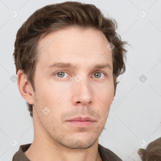 Neutral white young-adult male with short  brown hair and grey eyes