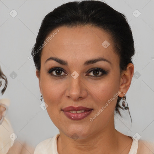 Joyful latino young-adult female with medium  brown hair and brown eyes