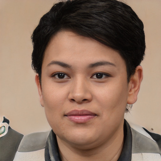 Joyful asian young-adult female with short  black hair and brown eyes