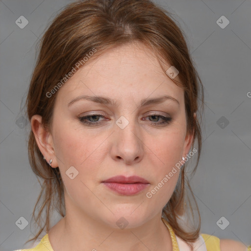 Joyful white young-adult female with medium  brown hair and blue eyes