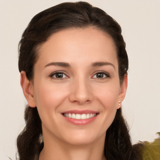 Joyful white young-adult female with medium  brown hair and brown eyes