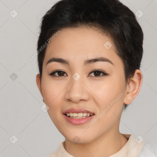 Joyful asian young-adult female with short  brown hair and brown eyes