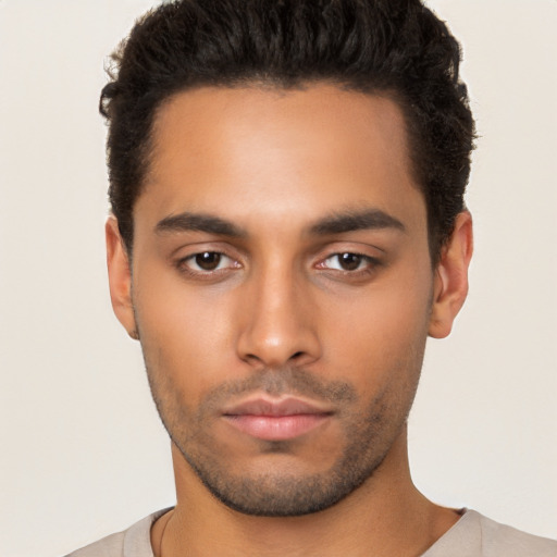 Neutral latino young-adult male with short  brown hair and brown eyes