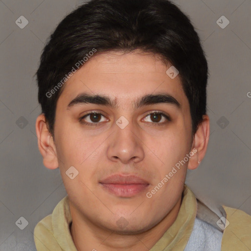 Joyful latino young-adult male with short  brown hair and brown eyes