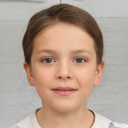 Joyful white child female with short  brown hair and brown eyes