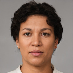 Neutral white young-adult female with short  brown hair and brown eyes