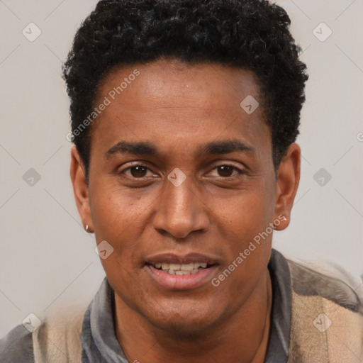 Joyful black adult male with short  black hair and brown eyes