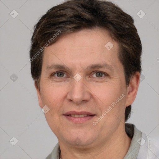 Joyful white adult male with short  brown hair and grey eyes