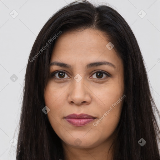 Joyful latino young-adult female with long  brown hair and brown eyes