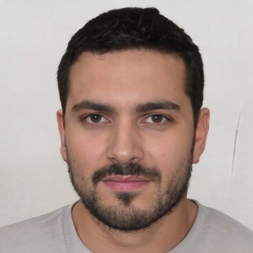 Neutral white young-adult male with short  black hair and brown eyes