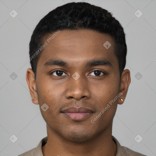 Joyful black young-adult male with short  black hair and brown eyes