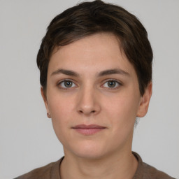 Neutral white young-adult female with short  brown hair and brown eyes