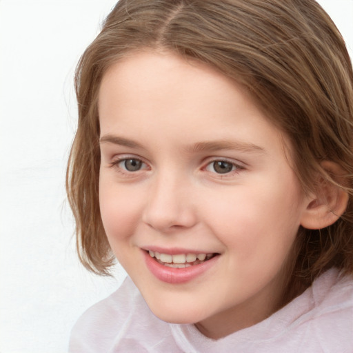 Joyful white child female with medium  brown hair and brown eyes