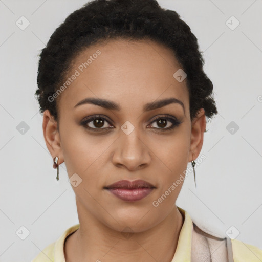 Joyful latino young-adult female with short  brown hair and brown eyes