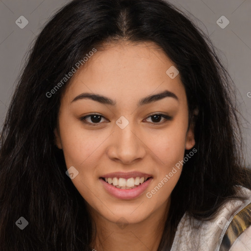 Joyful latino young-adult female with long  brown hair and brown eyes