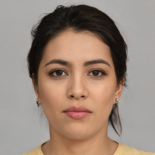 Neutral asian young-adult female with medium  brown hair and brown eyes