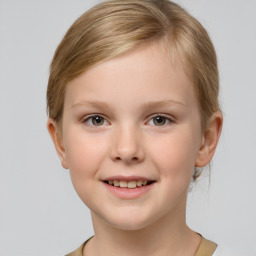 Joyful white child female with short  brown hair and brown eyes