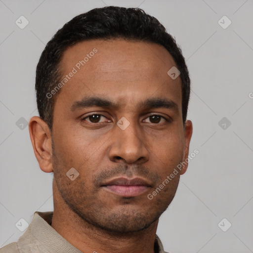 Neutral latino young-adult male with short  brown hair and brown eyes