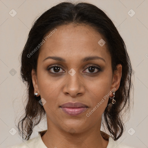 Joyful black young-adult female with medium  brown hair and brown eyes