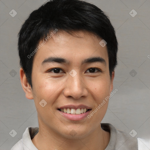 Joyful asian young-adult male with short  brown hair and brown eyes