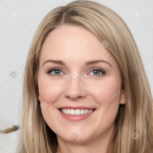 Joyful white young-adult female with long  brown hair and grey eyes