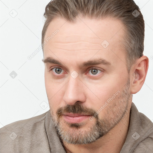 Neutral white adult male with short  brown hair and brown eyes