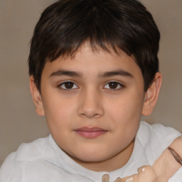 Joyful white child male with short  brown hair and brown eyes