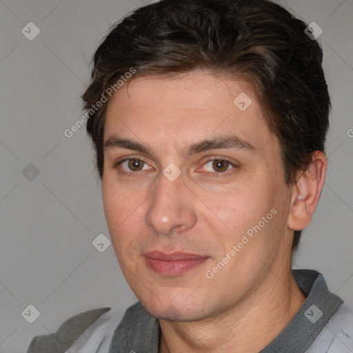 Joyful white adult male with short  brown hair and brown eyes