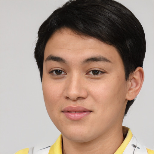 Joyful asian young-adult male with short  brown hair and brown eyes