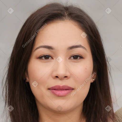 Joyful asian young-adult female with long  brown hair and brown eyes