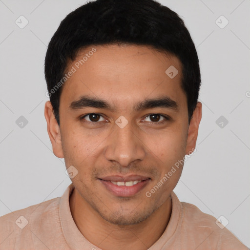 Joyful latino young-adult male with short  black hair and brown eyes