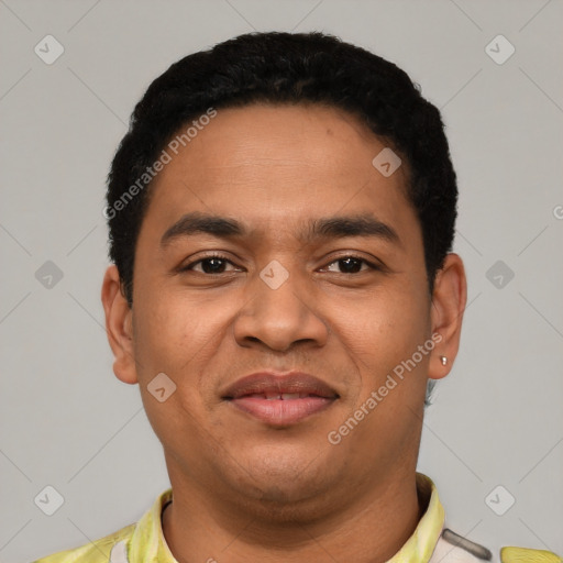 Joyful latino young-adult male with short  black hair and brown eyes