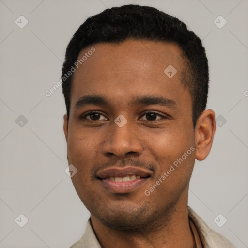 Joyful latino young-adult male with short  black hair and brown eyes