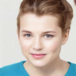 Joyful white child female with short  brown hair and grey eyes