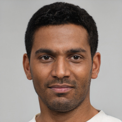 Neutral black young-adult male with short  black hair and brown eyes