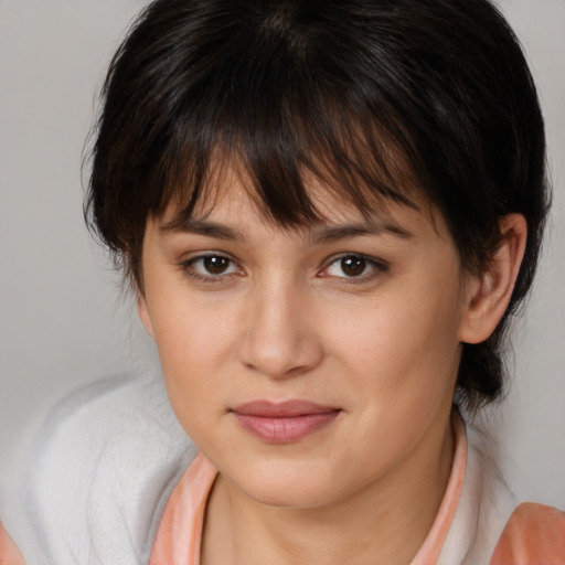 Joyful white young-adult female with medium  brown hair and brown eyes