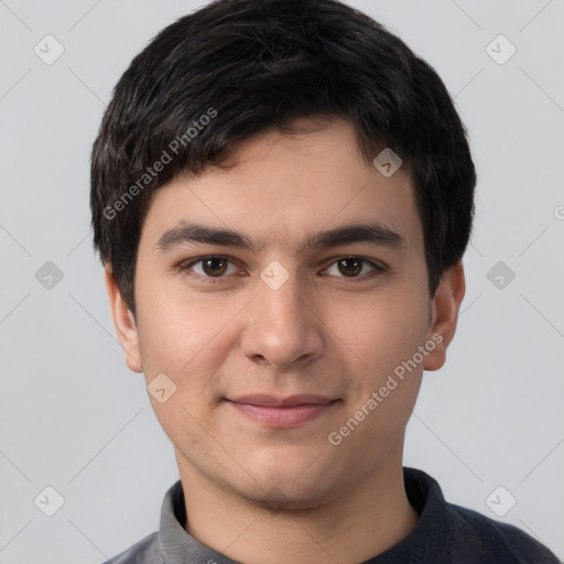 Joyful white young-adult male with short  black hair and brown eyes